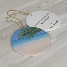Load image into Gallery viewer, Original artwork front, description on back. Thick high-quality porcelain. 7cm diameter. Comes w/ ribbon by Kerry Sandhu Art

