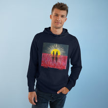Load image into Gallery viewer, Original painting of a rising sun which is an abstract version of the Aboriginal flag with the silhouette of an Aboriginal holding a spear and a soldier holding a gun surrounded by red poppies on the front of a pullover hoodie available in various colours
