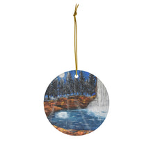 Load image into Gallery viewer, Original painting of a full moon and water reflection next to a waterfall  on a round ceramic ornament with hanging string
