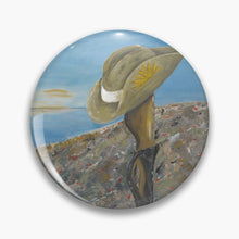 Load image into Gallery viewer, Original painting of a Digger&#39;s slouch hat resting on a gun with an ANZAC inspired Crest on a round unisex pin
