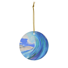 Load image into Gallery viewer, Original painting of a tubular blue and turquoise wave about to crash ion a round ceramic ornament with hanging string
