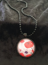 Load image into Gallery viewer, 25mm Black Pendant &amp; Chain - Original painting of red poppies with an abstract background
