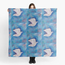 Load image into Gallery viewer, Original painting of a white bird with a blue abstract background on a large square 140 x 140cm scarf / wrap / shawl
