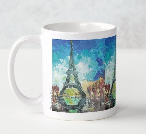 Original impressionistic painting of the Eiffel Tower and it's reflection in water on a ceramic mug