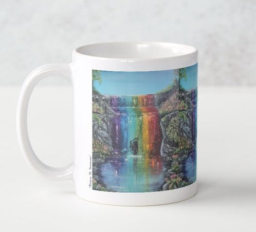 Original artwork of a silhouette of a lady under a chakra / rainbow / pride coloured waterfall on a ceramic mug